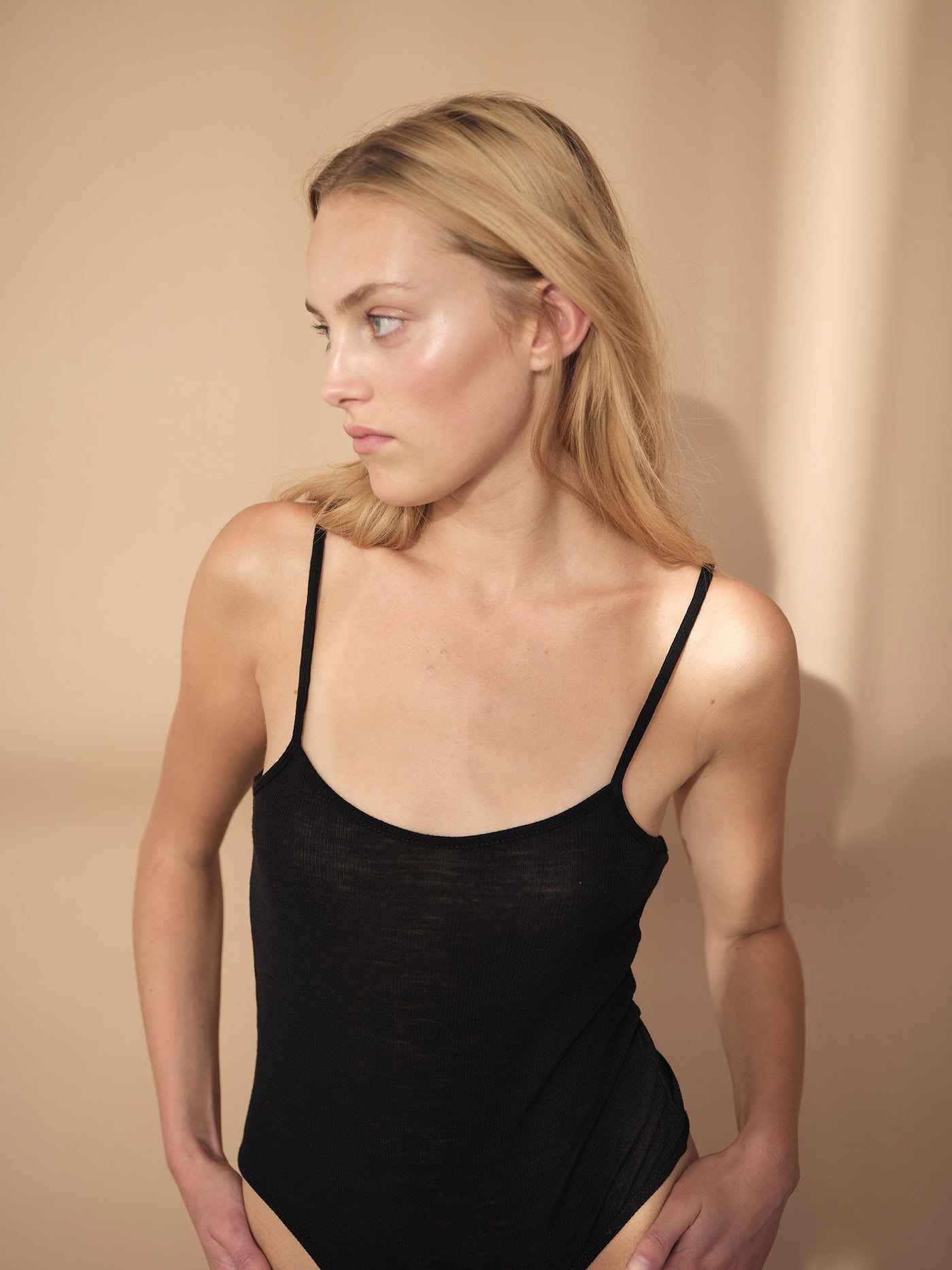 Female wearing our Amalie Wool Bodystocking. Seen from the front. 