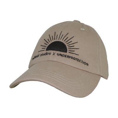 Underprotection hat in brown with a black logo made of organic 100% cotton 