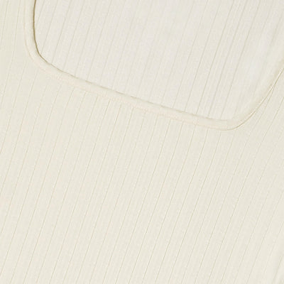 A closeup of the Celine Long Sleeve Bodystocking Creme.