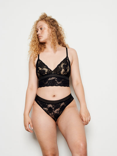 Female wearing our Gilda Bralette Black. Seen from the front.